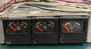 (Q8) Three Gauge Cluster, 708-615-2887, Mitchell 